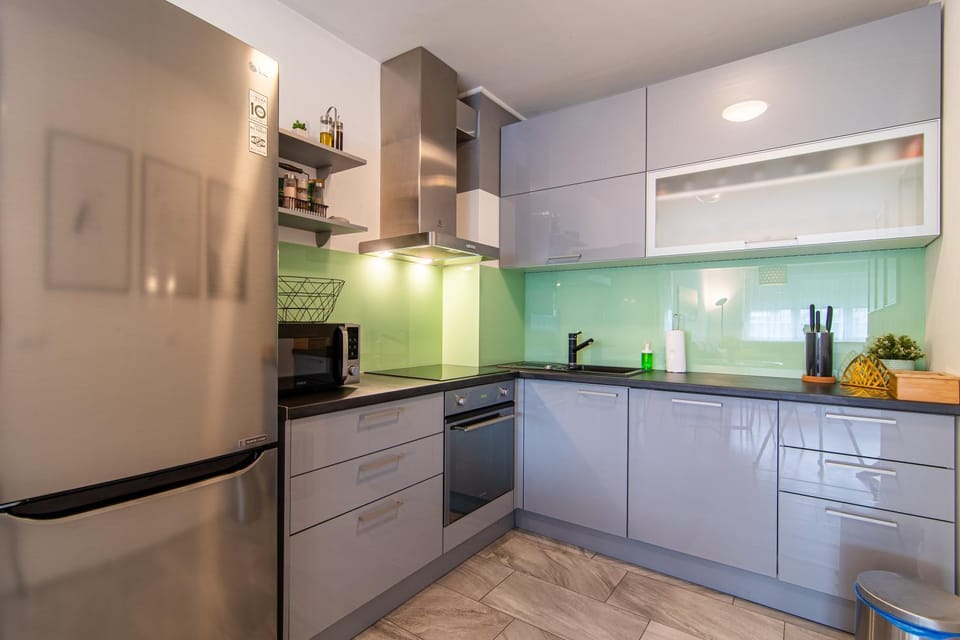 Kitchen or kitchenette, oven, stove