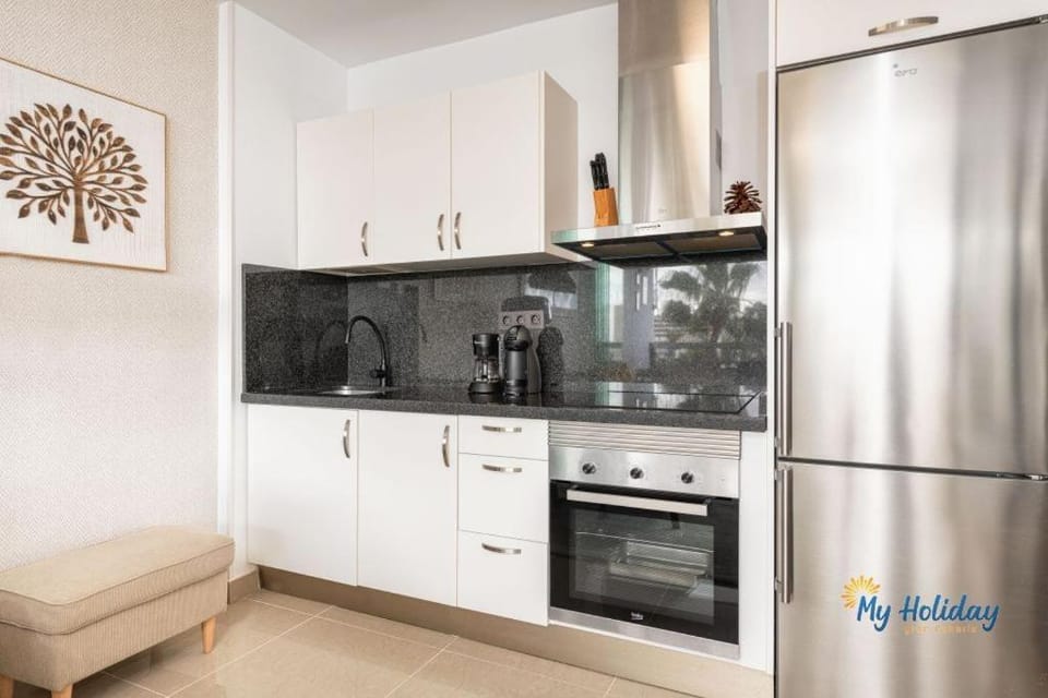 Kitchen or kitchenette, oven, stove