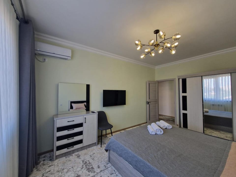 Bed, Bedroom, towels, wardrobe, air conditioner