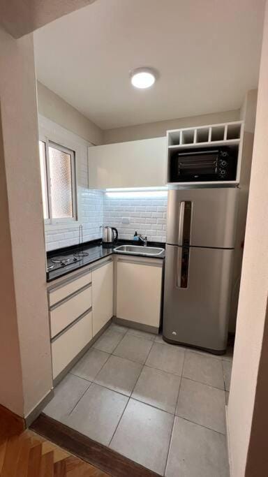 Kitchen or kitchenette, oven