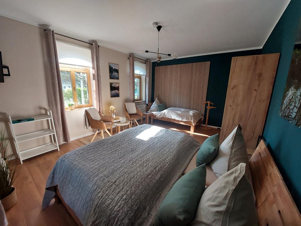 Bed, Living room, Seating area, Bedroom