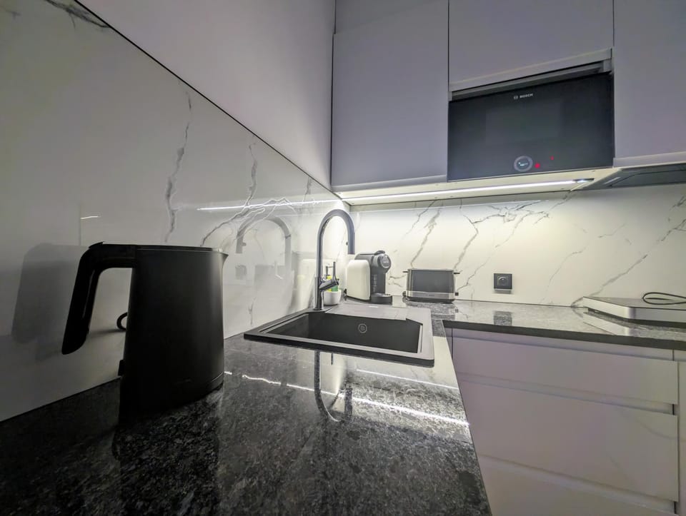 Kitchen or kitchenette, oven, stove