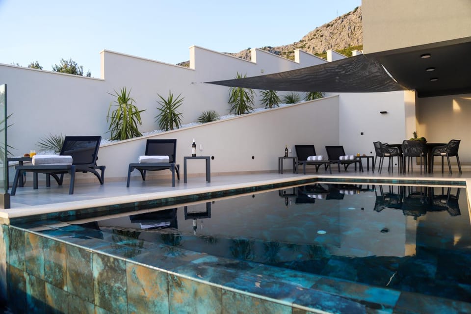 Patio, Seating area, Swimming pool, sunbed