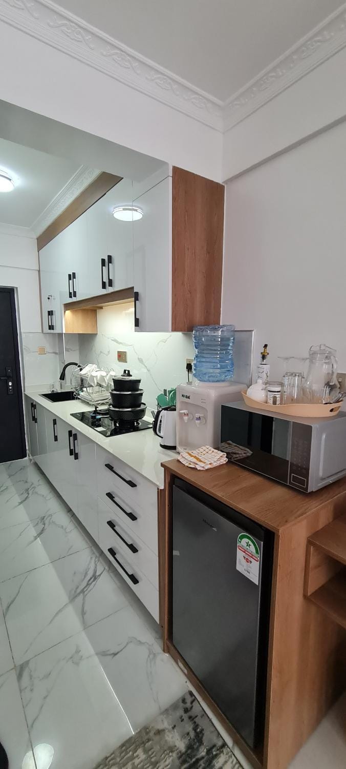 Kitchen or kitchenette, stove