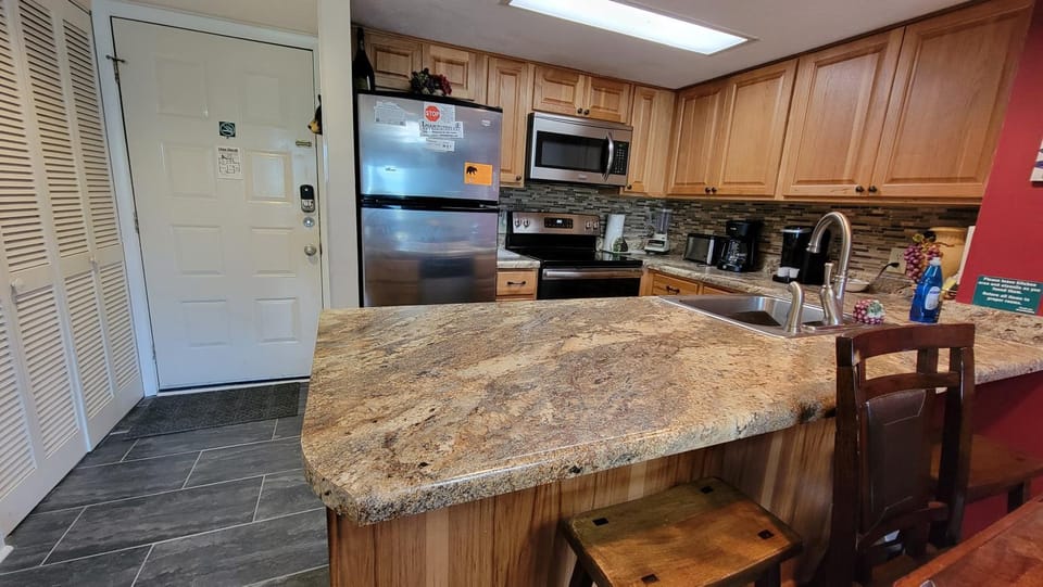 Kitchen or kitchenette, Dining area, dishwasher, oven, stove, toaster