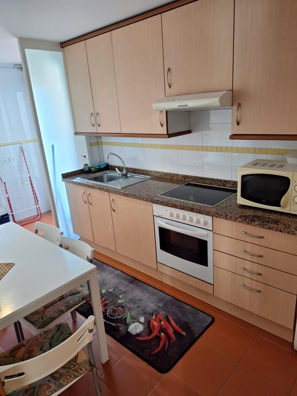 Kitchen or kitchenette, stove