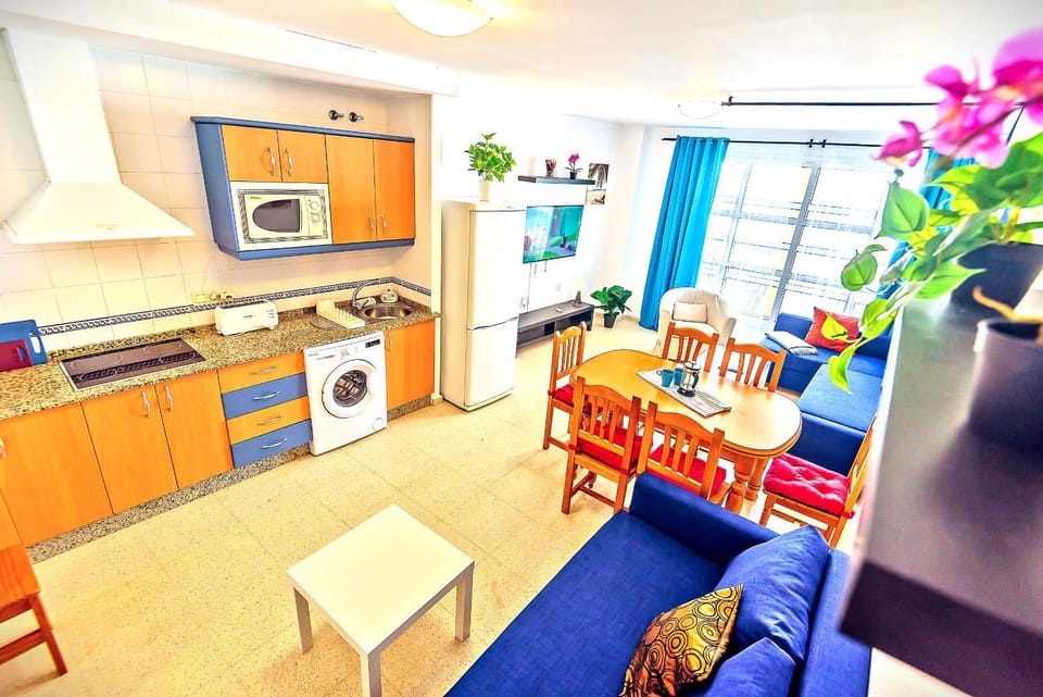 Bed, TV and multimedia, Balcony/Terrace, Living room, Seating area, Dining area, microwave, stove, toaster, washing machine, kitchen, air conditioner