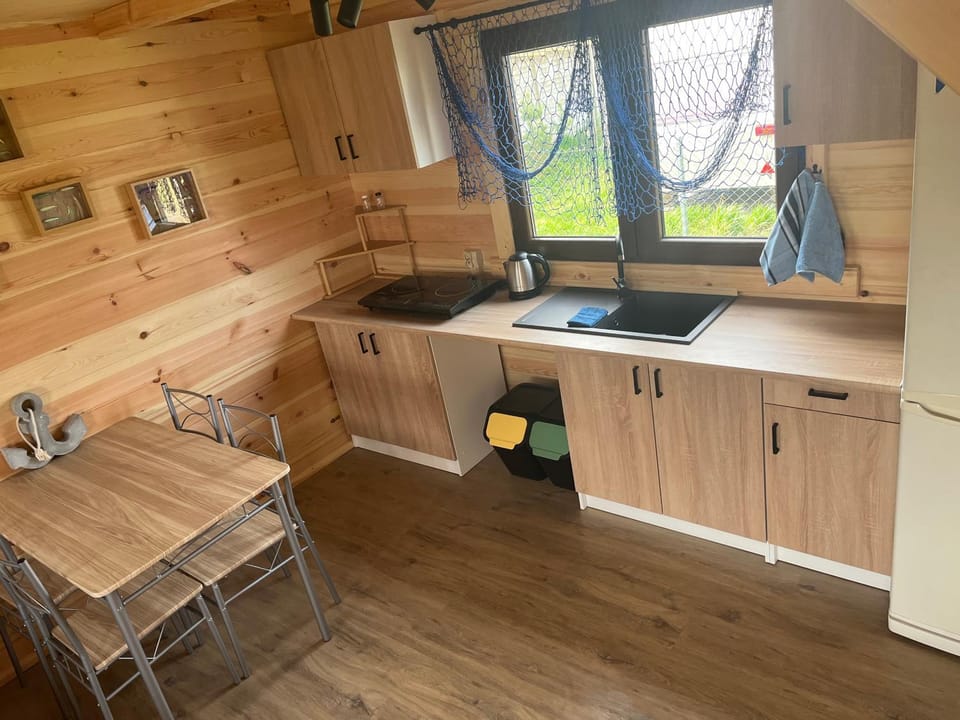 Swojskie Chatki - Rybacka Chatka House in Pomeranian Voivodeship