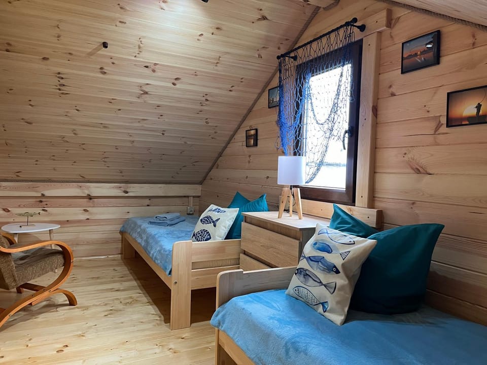 Swojskie Chatki - Rybacka Chatka House in Pomeranian Voivodeship