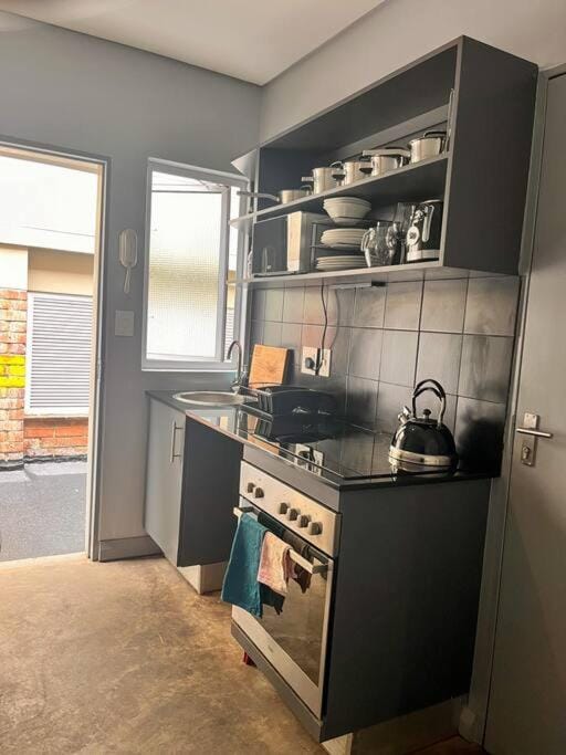 Kitchen or kitchenette, oven, stove