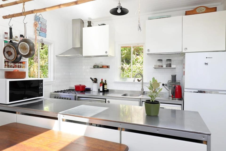Kitchen or kitchenette, dishwasher, oven, stove, toaster