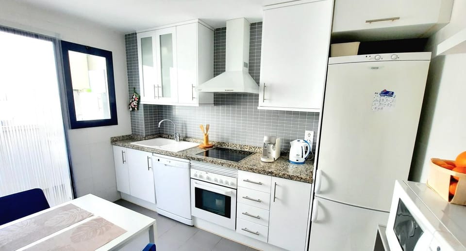 Kitchen or kitchenette, oven, stove