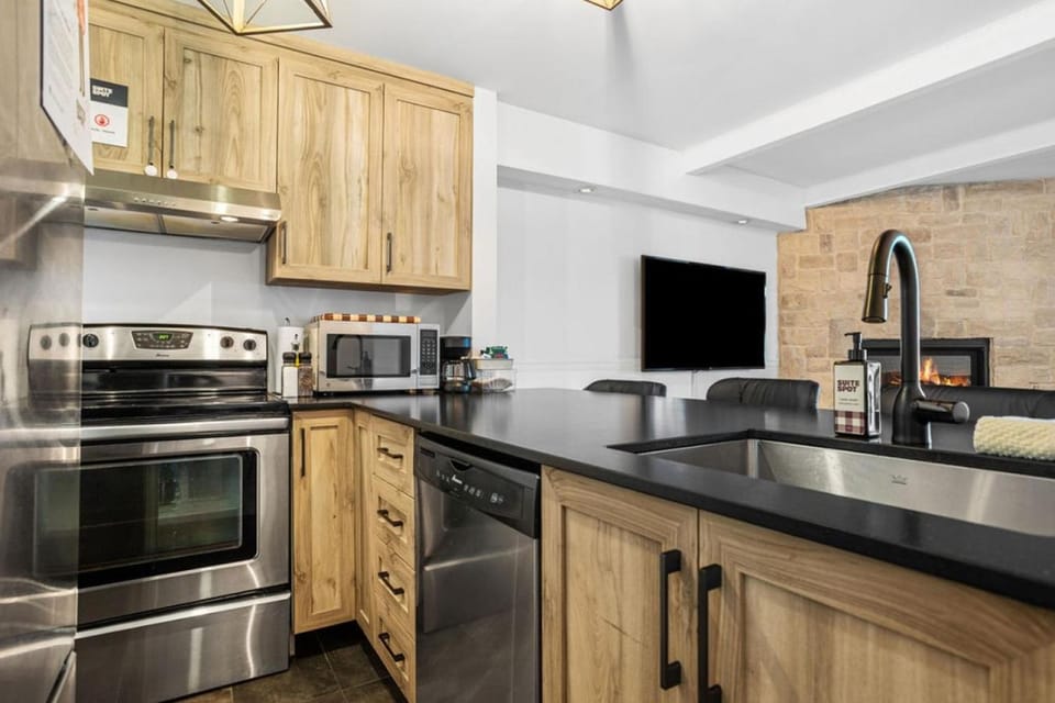 Kitchen or kitchenette, dishwasher, microwave, oven