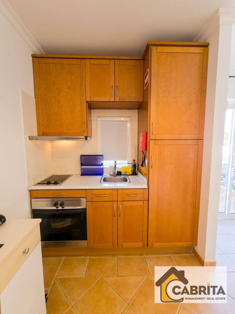 Kitchen or kitchenette, oven, stove