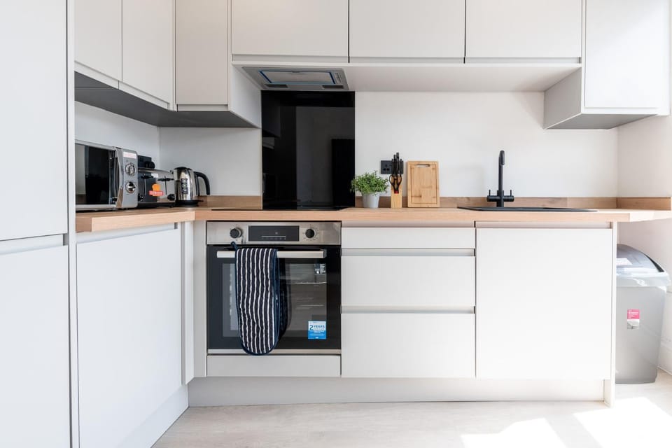 Kitchen or kitchenette, oven, stove, toaster