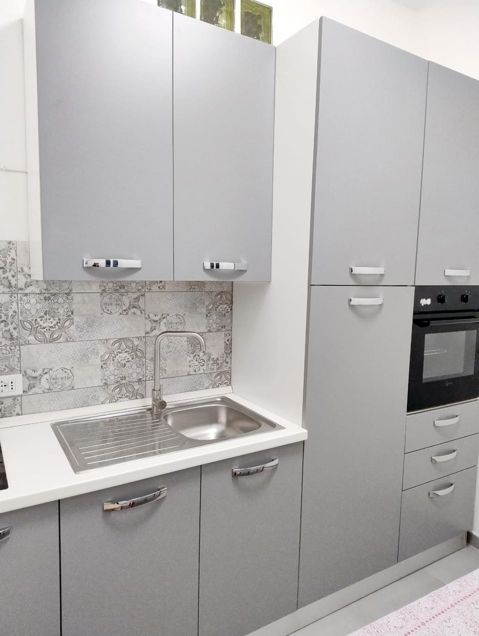 Kitchen or kitchenette, oven, stove