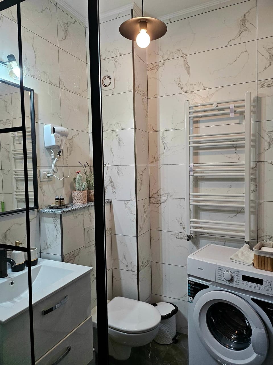 Shower, Toilet, Bathroom, towels, washing machine, dryer