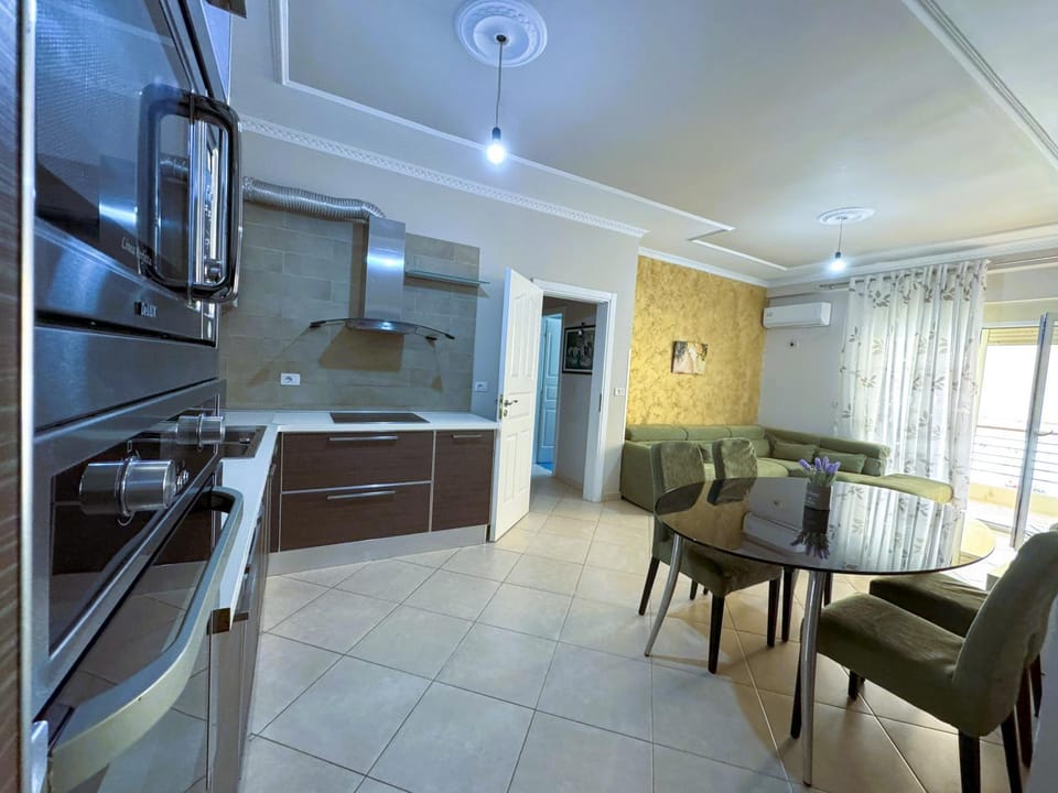 Kitchen or kitchenette, Living room, Seating area, Dining area, stove