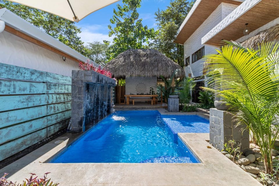 Modern Home with Chic Bohemian Style and Zen Outdoor Oasis with Swimming Pool and Tiki Style Dining Space House in Guanacaste Province