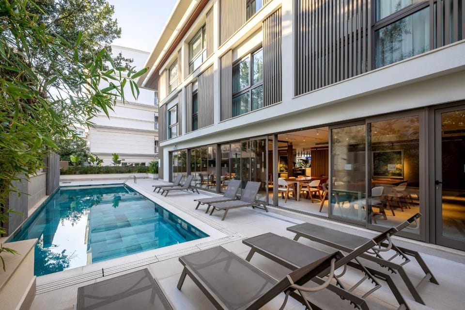 Patio, Day, Pool view, Swimming pool, sunbed