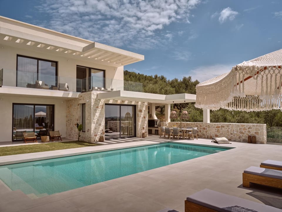 Property building, Patio, Pool view, Swimming pool, sunbed