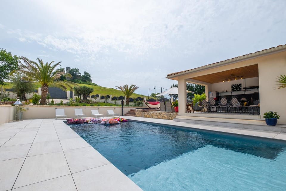 Property building, Living room, Swimming pool