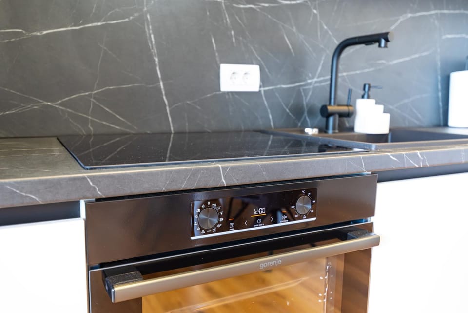 Kitchen or kitchenette, oven, stove