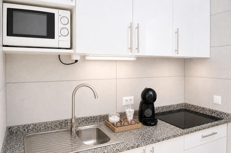 Kitchen or kitchenette, stove