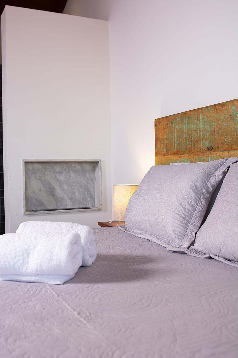 Bed, fireplace