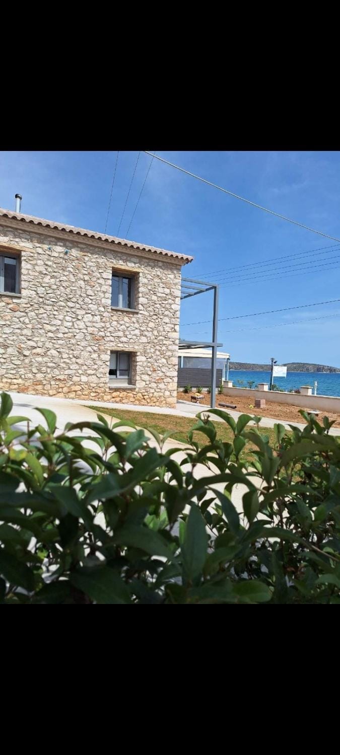Property building, Day, Natural landscape, Beach, Sea view