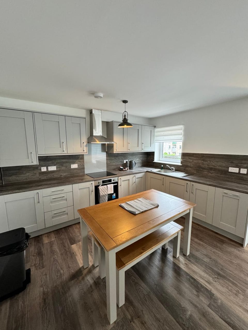 Kitchen or kitchenette, Dining area, dishwasher, stove, toaster