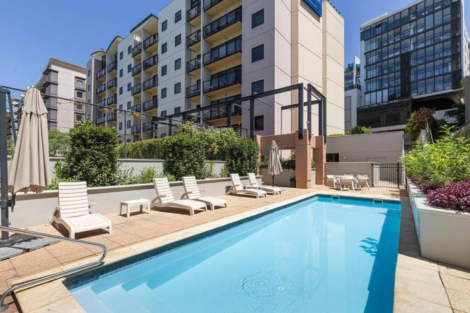 Property building, Swimming pool, Swimming pool, sunbed