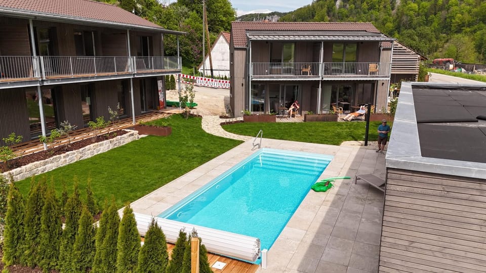 Property building, Living room, Swimming pool