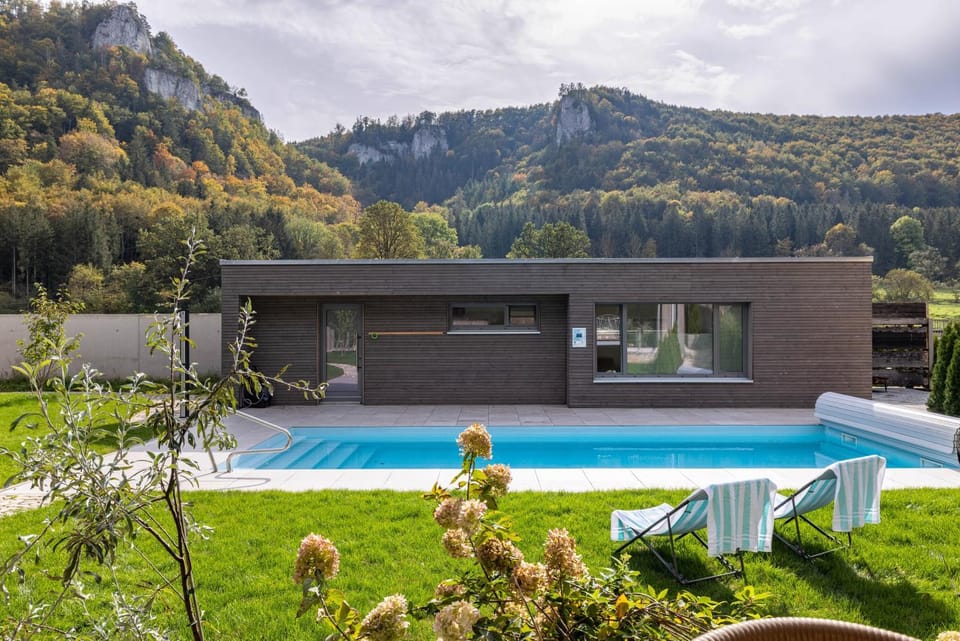 Property building, Living room, Swimming pool