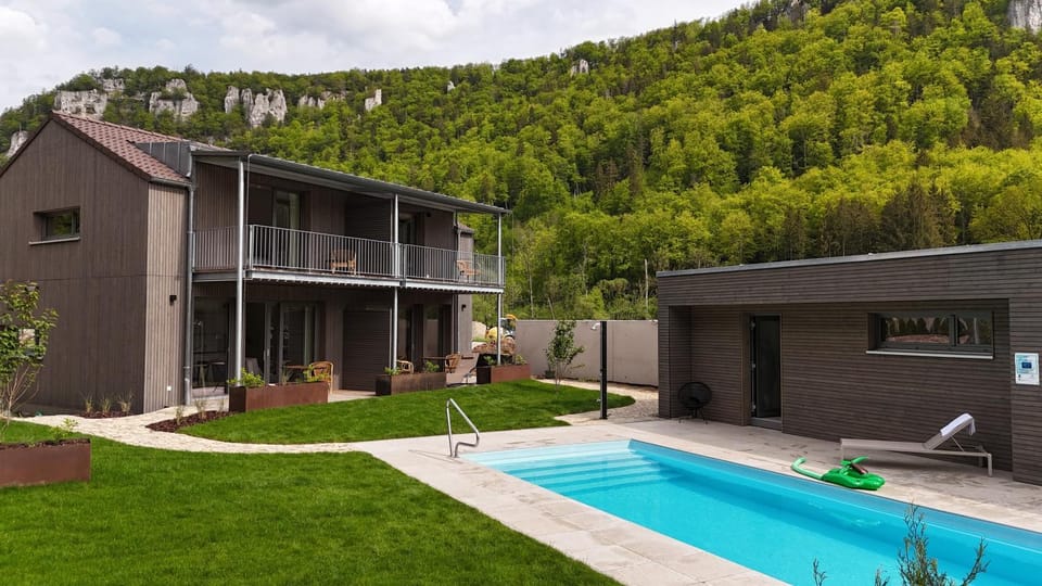 Property building, Living room, Swimming pool