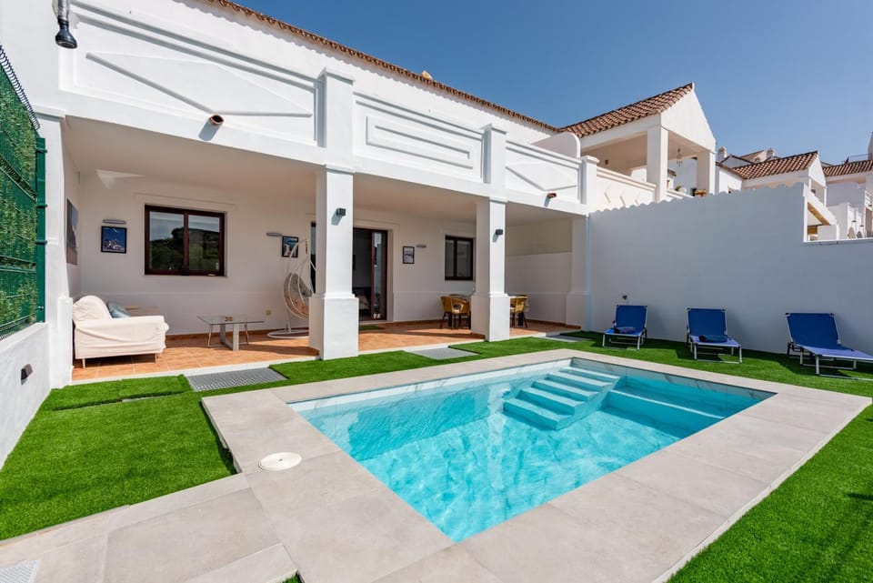Property building, Living room, Swimming pool