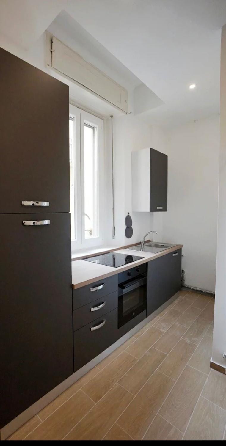 Kitchen or kitchenette, oven, stove