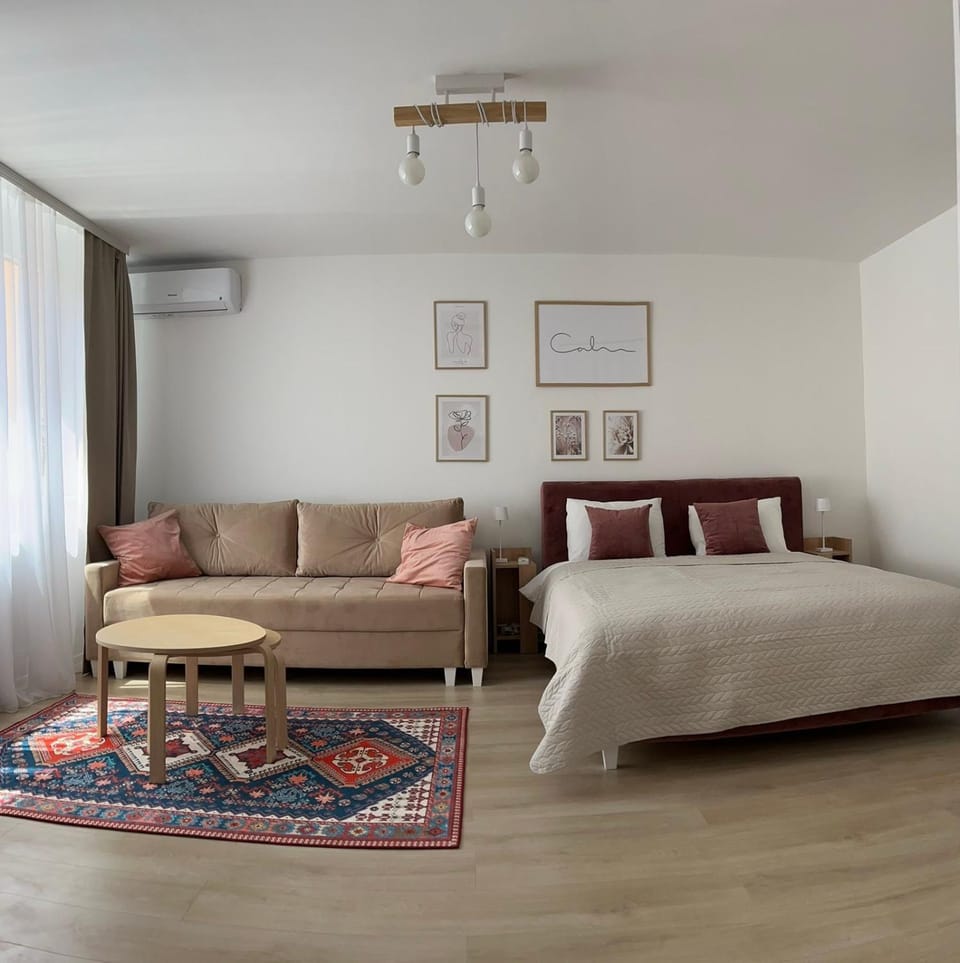 Bed, Living room, Seating area, Bedroom, air conditioner