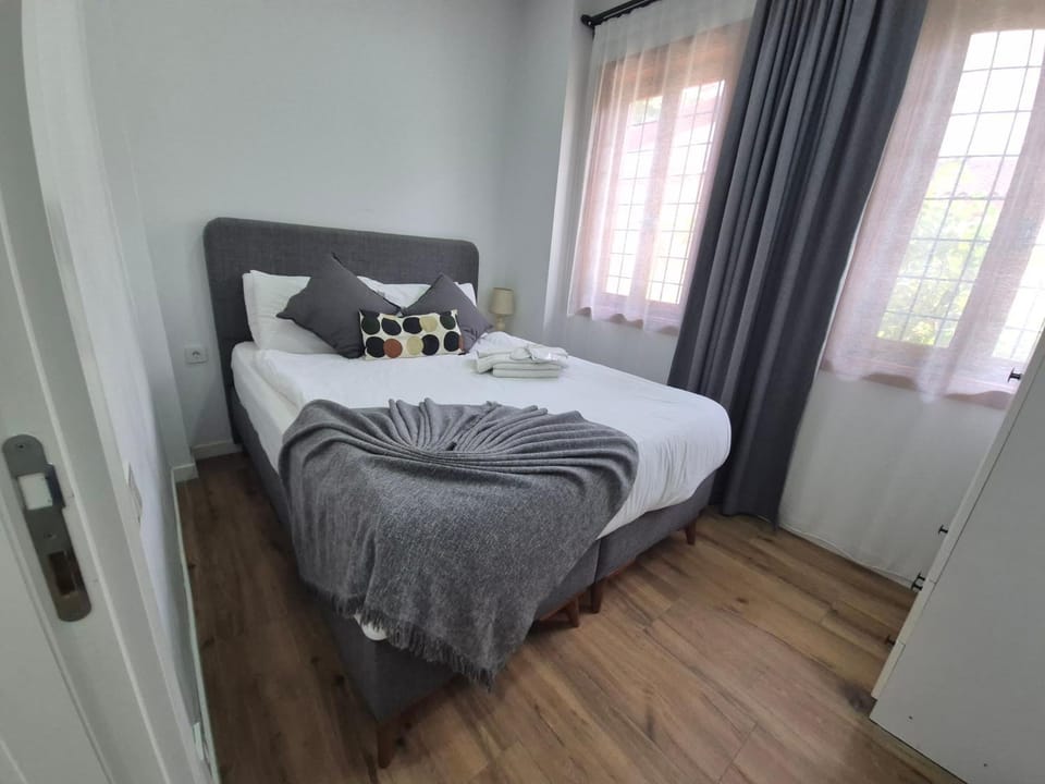 Bed, Photo of the whole room, Bedroom, towels, air conditioner