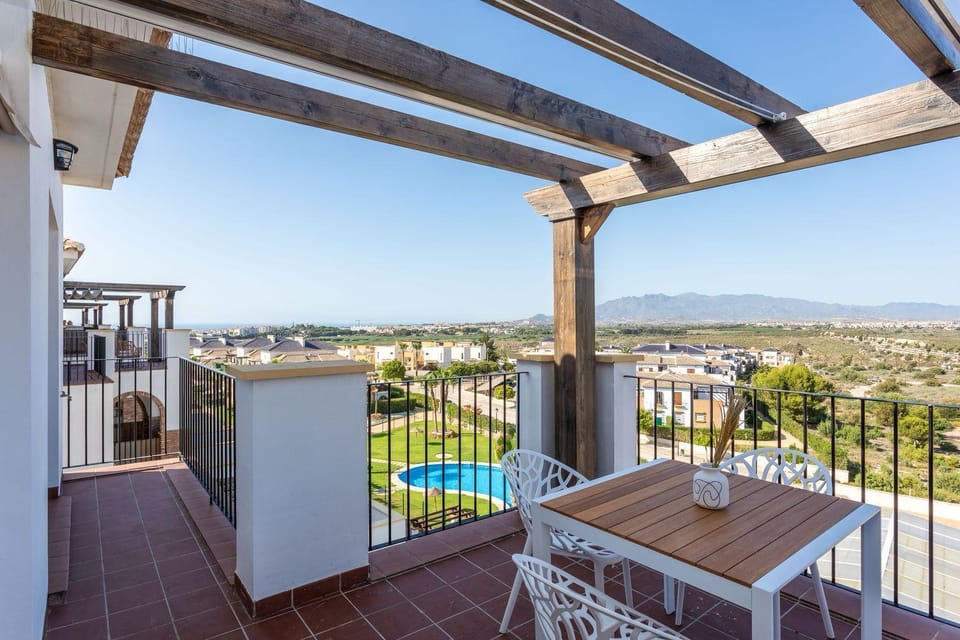 Property building, View (from property/room), Balcony/Terrace, Dining area, Mountain view, Pool view