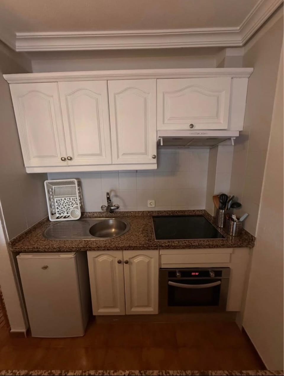 Kitchen or kitchenette, stove, kitchen