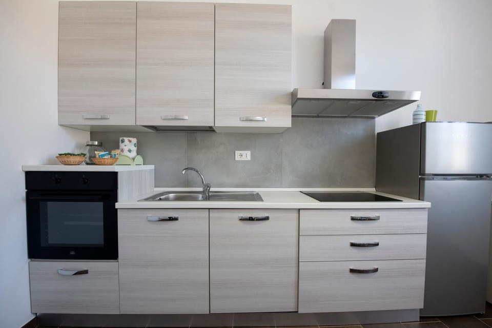 Kitchen or kitchenette, stove, kitchen