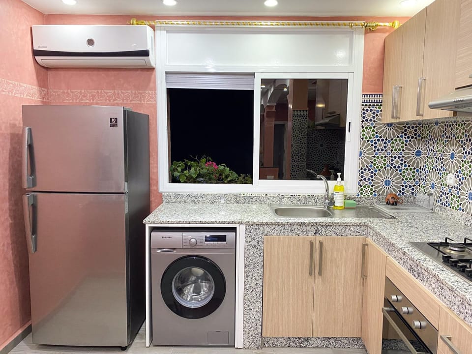 Kitchen or kitchenette, oven, washing machine, dryer, kitchen, air conditioner