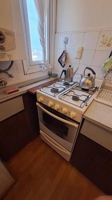 Kitchen or kitchenette, stove
