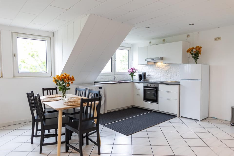 Kitchen or kitchenette, Dining area, dishwasher, stove, toaster