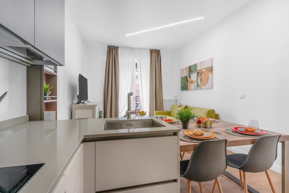 Kitchen or kitchenette, Living room, Seating area, Dining area