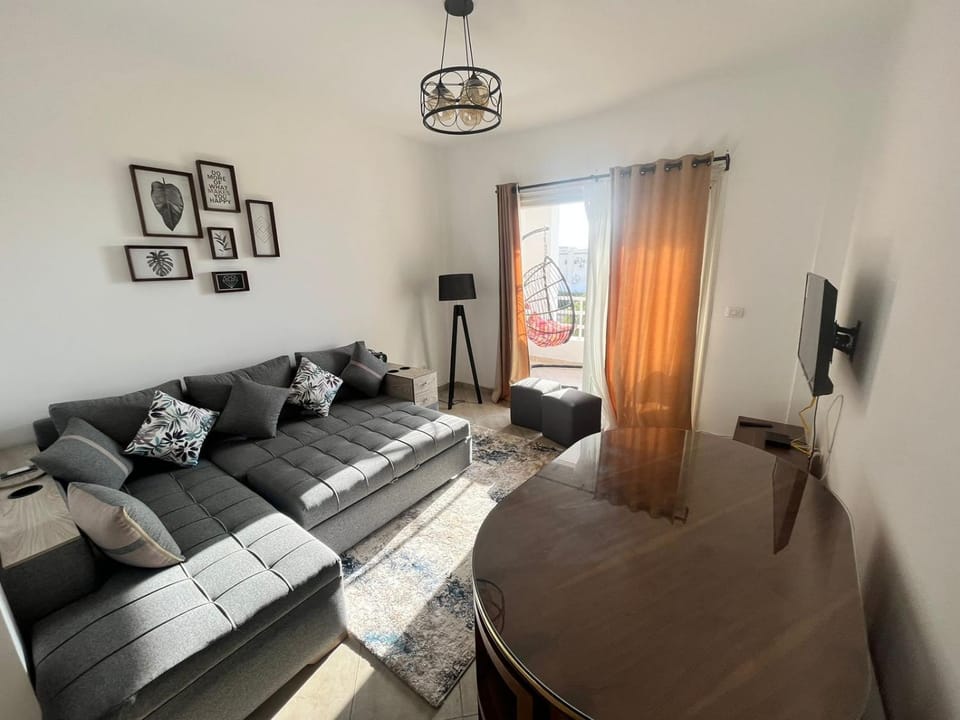 Bed, TV and multimedia, Living room, Seating area