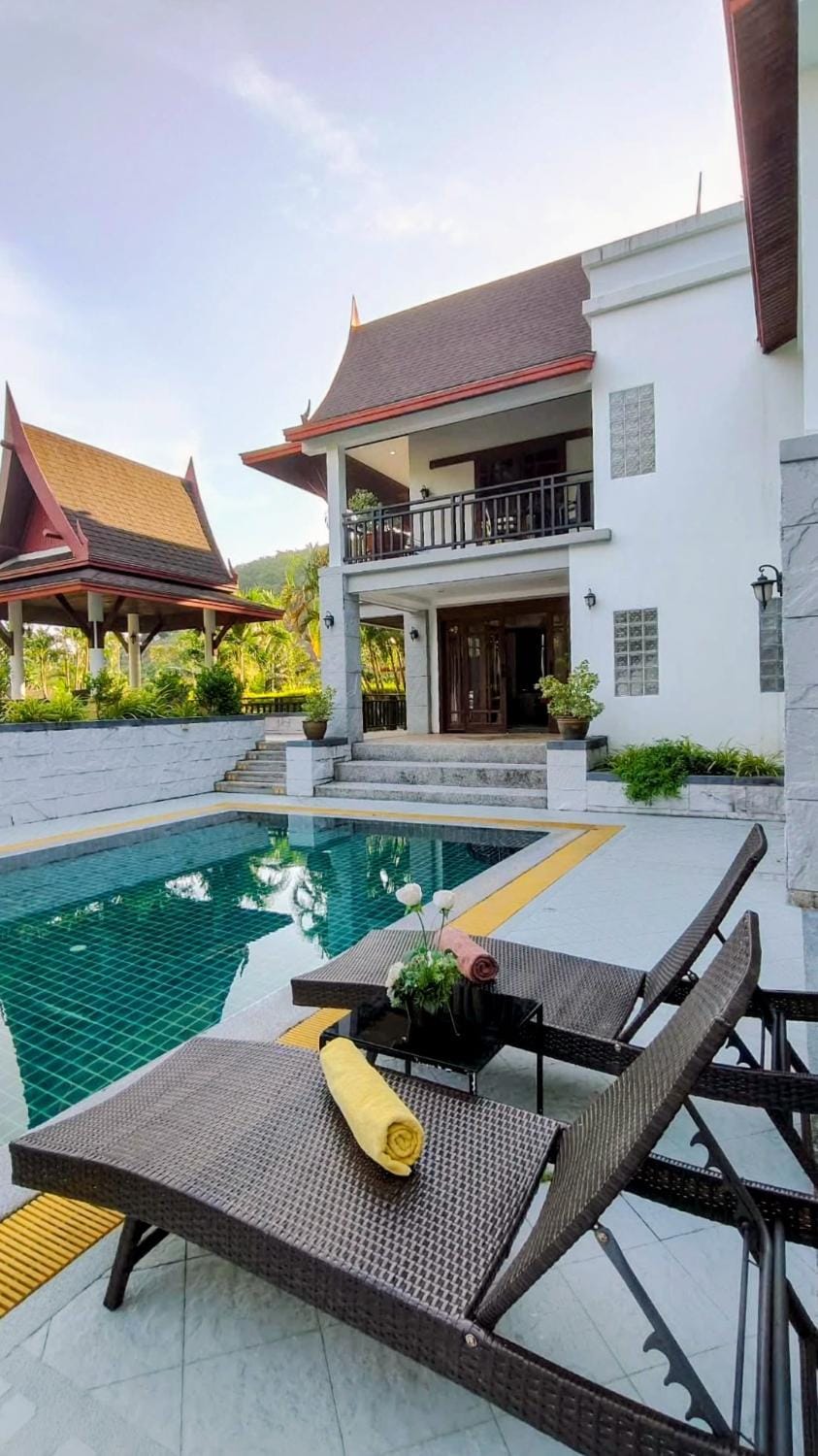 Property building, Patio, Pool view, Swimming pool, sunbed