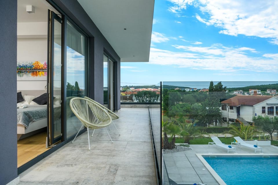 Property building, Patio, Day, Natural landscape, View (from property/room), Balcony/Terrace, Pool view, Swimming pool