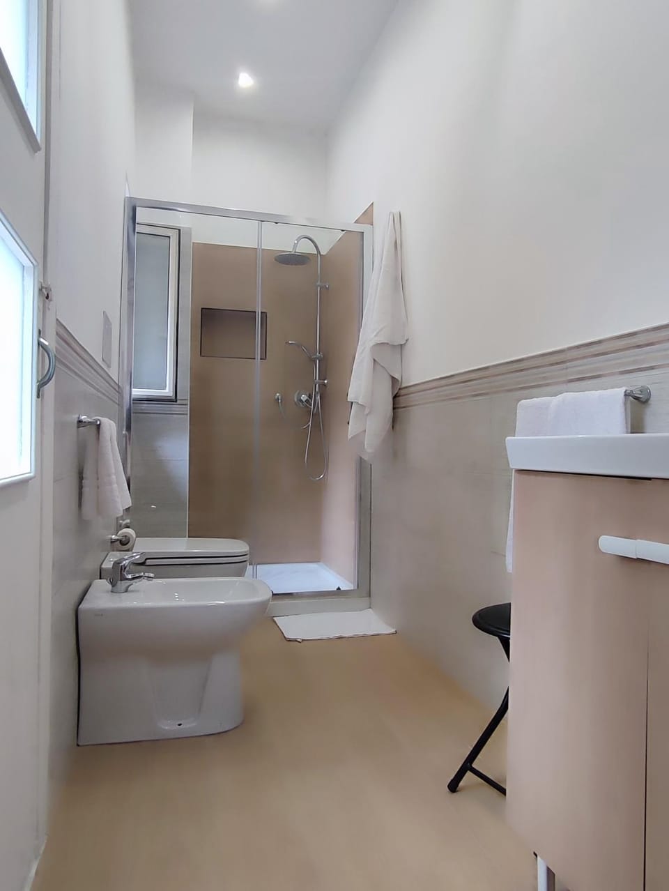 Shower, Toilet, Bathroom, hair dryier, towels